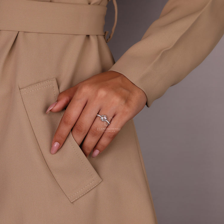 Hidden halo diamond ring with round rose cut centre stone.