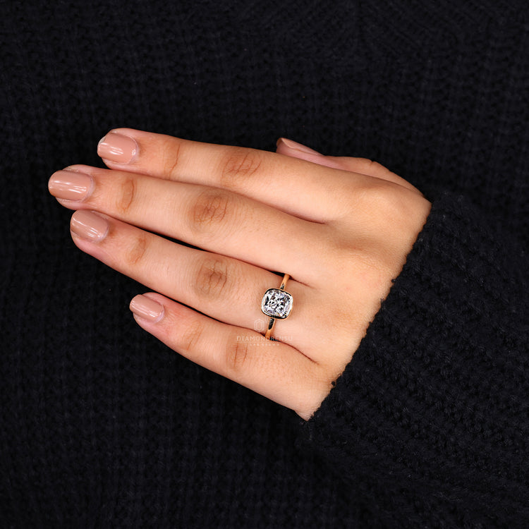 Cushion bezel set ring made in solitaire diamond ring.