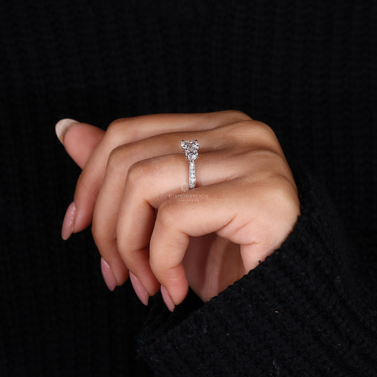 IGI certified 3 stone diamond engagement ring.