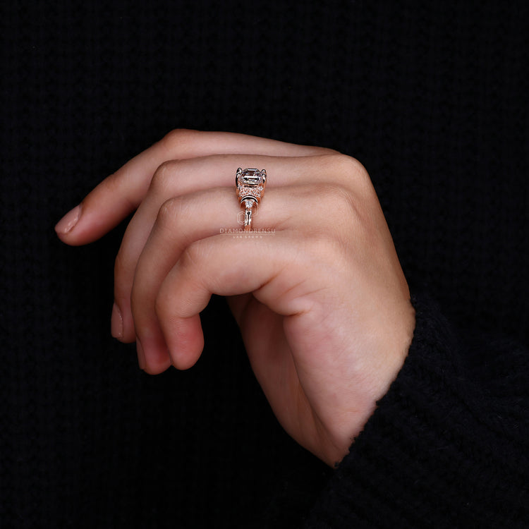 round diamond side stone in vintage engagement ring.