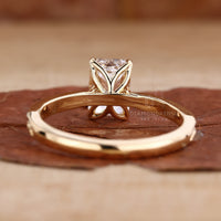 art deco engagement ring in 4 claw prong setting.