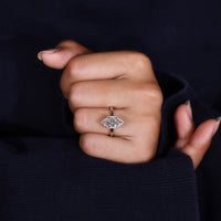 round cut halo ring with Dutch marquise shape.