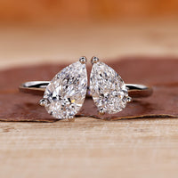 Toi Et Moi engagement ring with pear diamond in white gold.