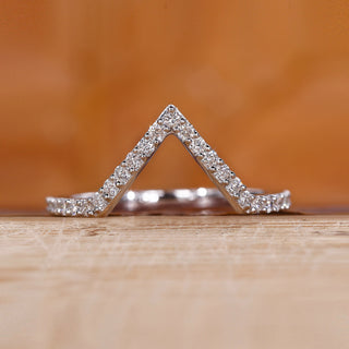 Chevron diamond wedding band in white gold.