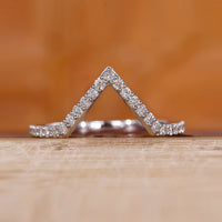 Chevron diamond wedding band in white gold.