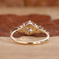 Handmade ring featuring round cut diamond stones.