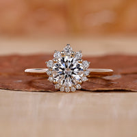 Halo diamond engagement ring with round cut diamond ring.