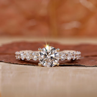 yellow gold engagement ring with prong setting.