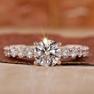 yellow gold engagement ring with prong setting.