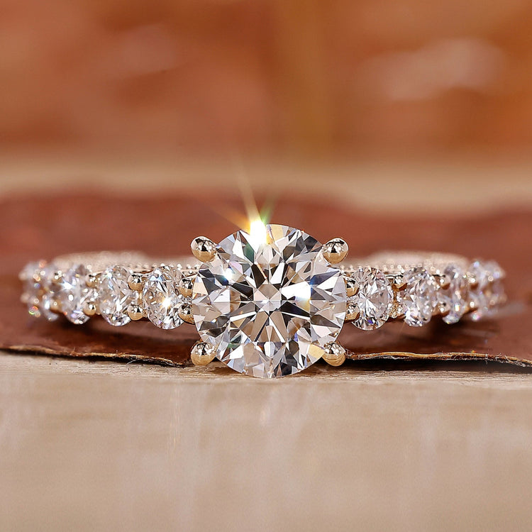 yellow gold engagement ring with prong setting.