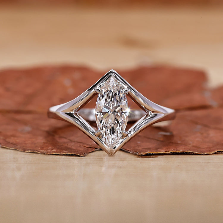 Marquise engagement ring in white gold diamond ring.