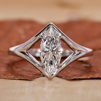 Marquise engagement ring in white gold diamond ring.