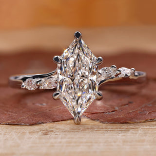 Dutch Marquise Engagement Ring with bridge accent setting.