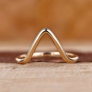 Gold chevron wedding band for her.