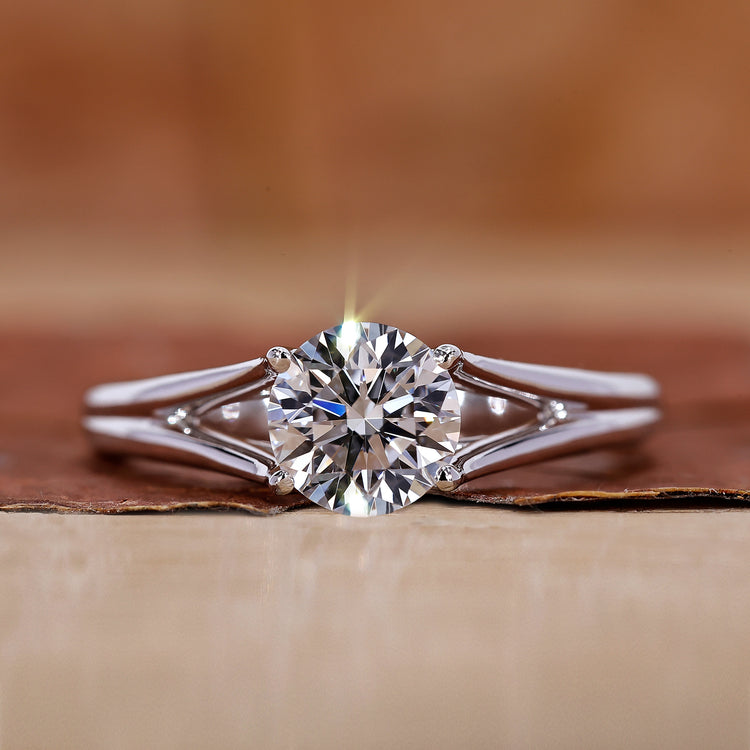 Solitaire engagement ring with round diamond ring.