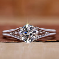 Solitaire engagement ring with round diamond ring.