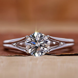 Solitaire engagement ring with round diamond ring.