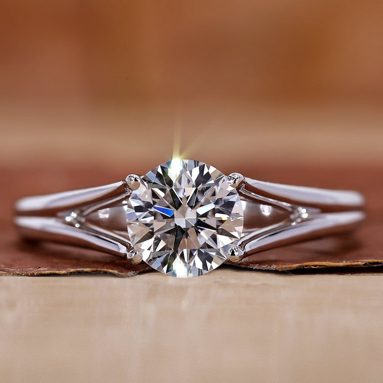 Solitaire engagement ring with round diamond ring.