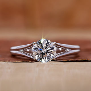 Solitaire engagement ring with round diamond ring.