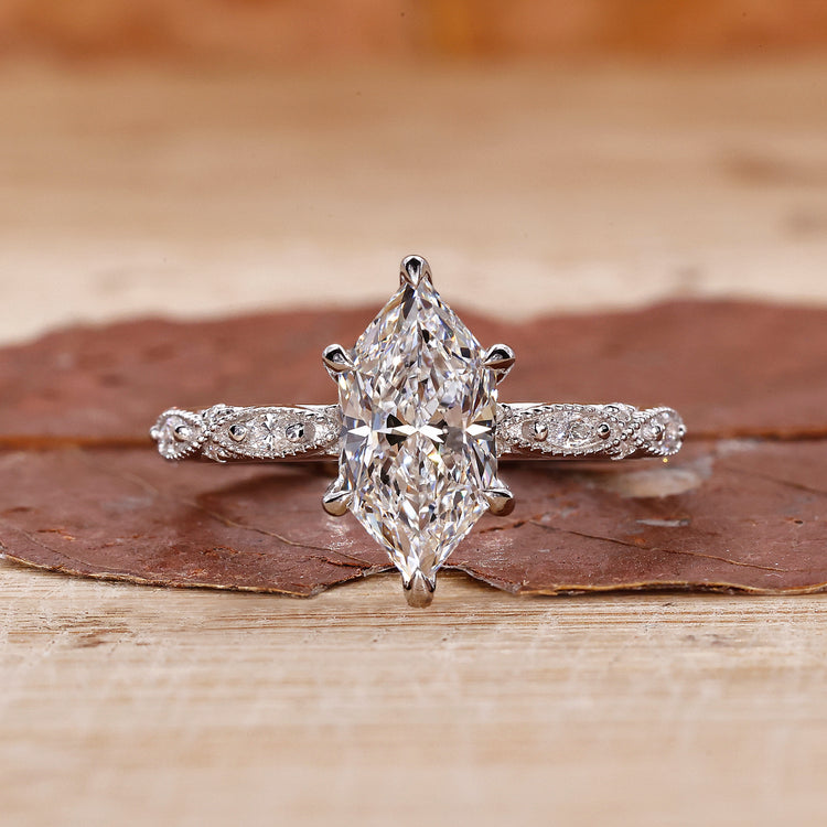 Milgrain engagement ring in white gold.