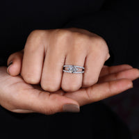 Diamondrensu Australia marquise ring with round side stones.