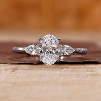 Three stone diamond ring in white gold ring.
