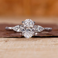 Three stone diamond ring in white gold ring.