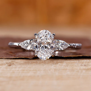 Three stone diamond ring in white gold ring.
