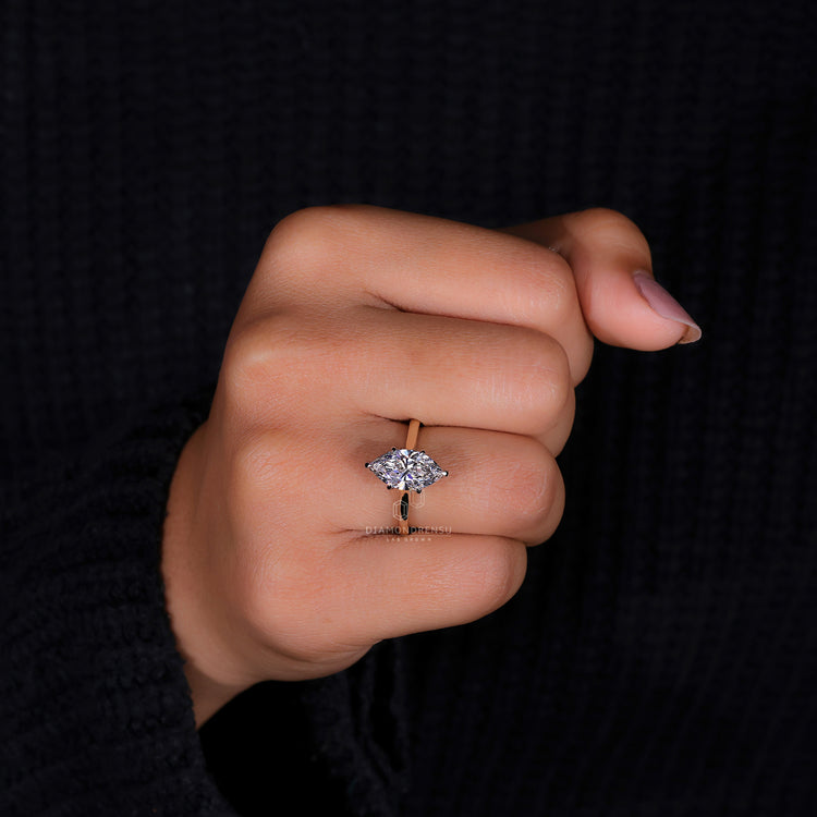Sophisticated marquise cut diamond ring for a bold statement.