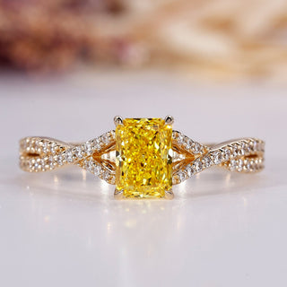 Yellow diamond engagement ring with radiant engagement ring.