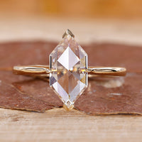 Yellow gold diamond ring with Dutch marquise cut and tapered shank.