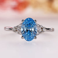 Oval diamond engagement ring set in muse setting.