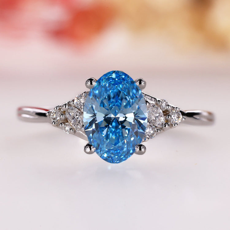 Oval diamond engagement ring set in muse setting.