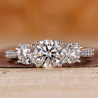3 stone diamond engagement ring with tapered pave engagement ring.