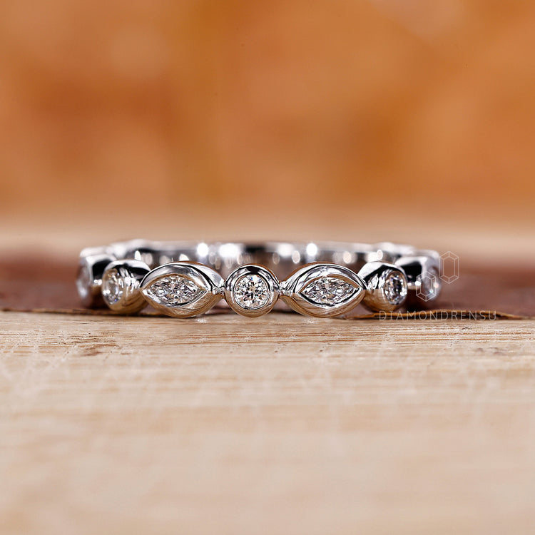 Bezel setting diamond band for stacking.