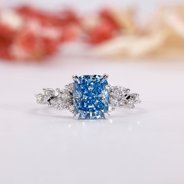 Blue diamond engagement ring with elegant sparkle.