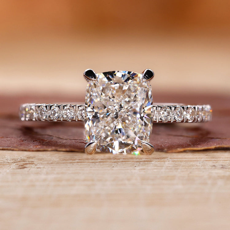 Cushion cut diamond ring with a hidden halo engagement ring.