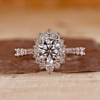 Round diamond ring with a halo ring setting.