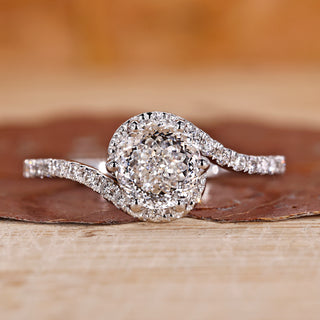 Portuguese cut diamond ring with bypass halo engagement ring.