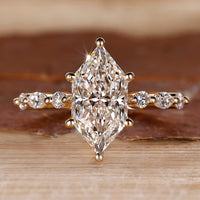 Dutch Marquise Cut Ring with 7 stone shared prong setting.