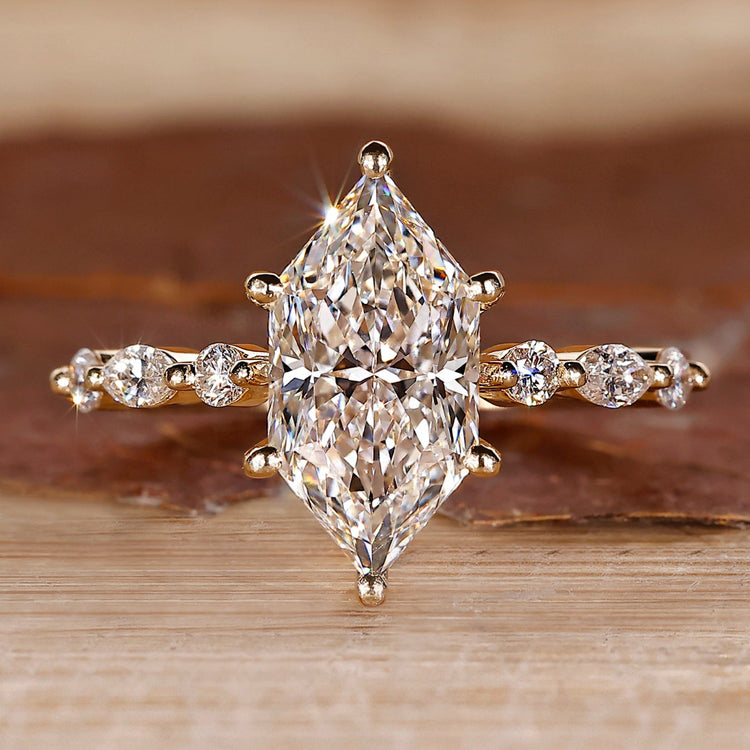 Dutch Marquise Cut Ring with 7 stone shared prong setting.