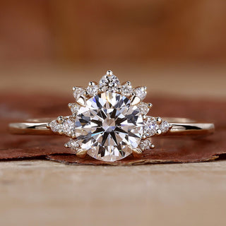 round diamond ring in yellow gold band.