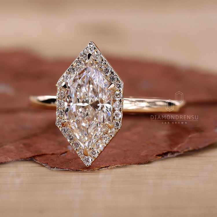 yellow gold engagement ring with halo setting.