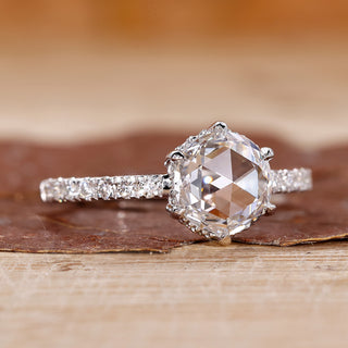 Pavé diamond ring with round rose cut diamond in white gold.