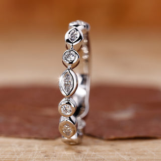 Marquise diamond wedding band in white gold.