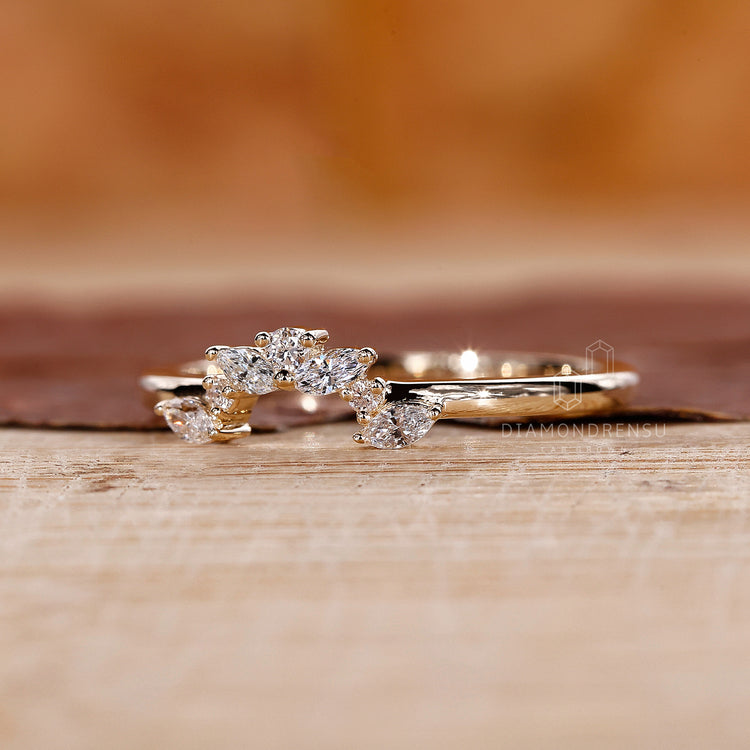 Round diamond band with prong setting details.