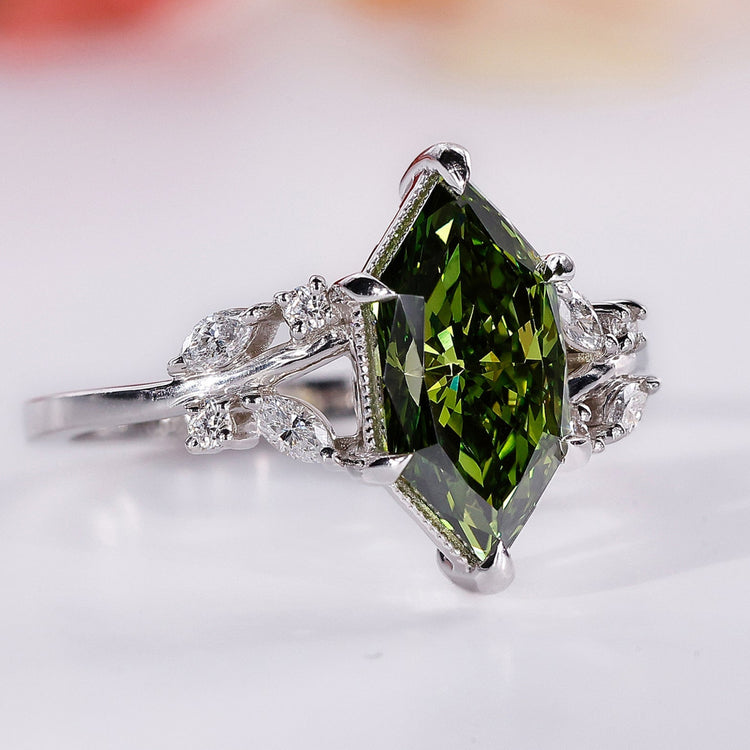 2 carat diamond ring with Dutch marquise diamond and marquise and round sidestones in white gold