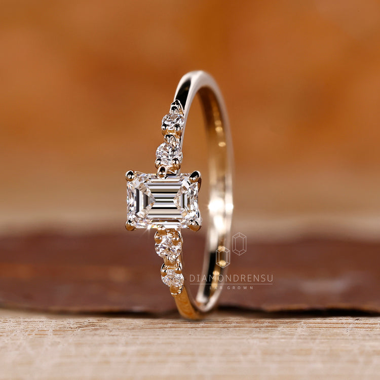 Round Diamond Side Stone Ring with IGI certified center.