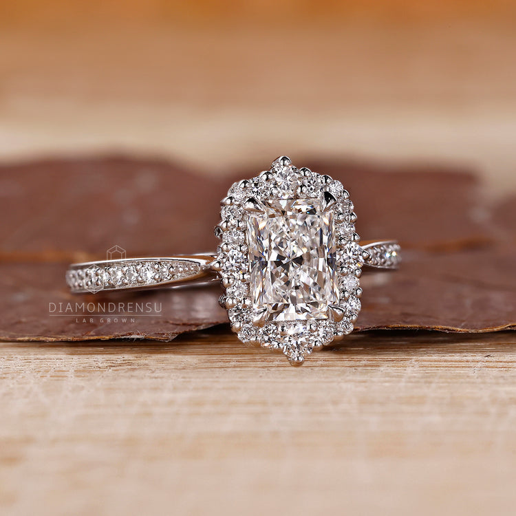 Round Cut Pave Ring with cathedral and prong details.