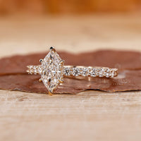 Dutch marquise ring with pave band engagement ring.